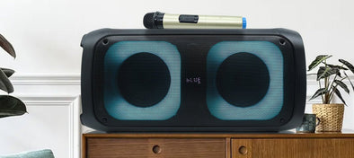 Twin speaker Karaoke Machine on side table