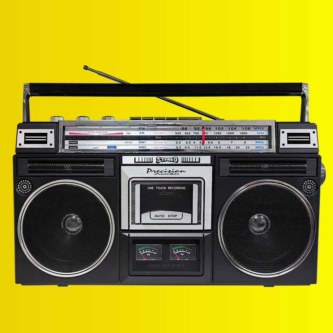 Retro style cassette player with yellow background